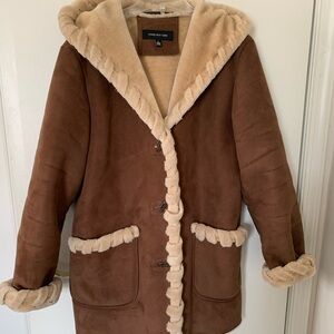 Fur-lined and fur trim winter coat.